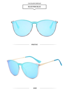 Detail of pink transparent aviator sunglasses with blue reflective lenses and gold metal arms