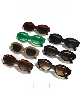Detail of retro oval cat-eye sunglasses in multiple colors with waterproof lenses