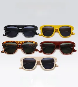 Close-up of retro square sunglasses collection in various colors with silver side rivets