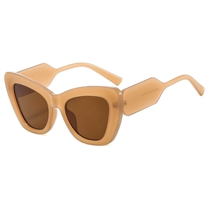 Fashionable oversized cat eye sunglasses in beige tea color with dark brown lenses