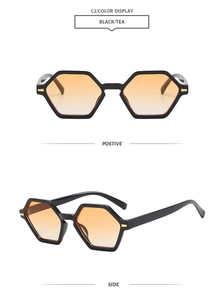 Detail view of hexagonal sunglasses with black frames and gradient tea lenses