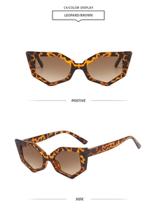 Detail view of leopard cat-eye sunglasses with brown gradient lenses and geometric frame