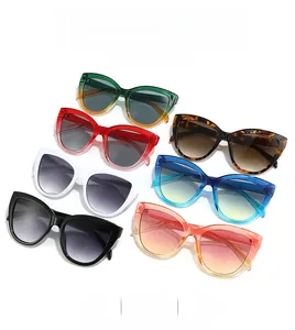 Macro display of cat eye sunglasses in seven vibrant colors with thick gradient lenses