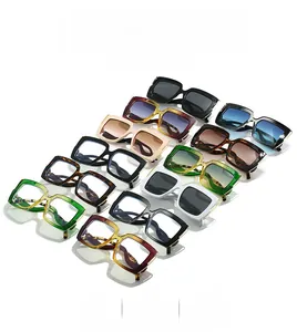 Array of oversized square frame sunglasses in multiple vibrant colors and tortoiseshell