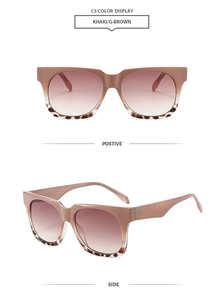 Detail of square vintage sunglasses with khaki frame and leopard print accents