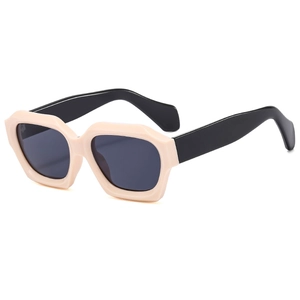 Chic polygonal sunglasses with beige thick frames, black temples and dark lenses