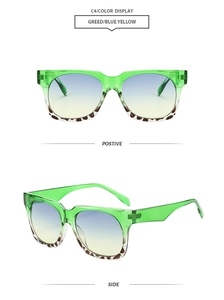 Detail of green transparent square frame sunglasses with leopard print and gradient lenses