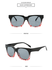 Detail view of square sunglasses featuring black and leopard print frames with gray lenses