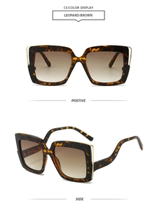 Detail of leopard print square frame sunglasses with gold trim and brown gradient lens