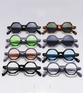 Multiple stylish retro hexagonal sunglasses frames in diverse colors with metal rivets