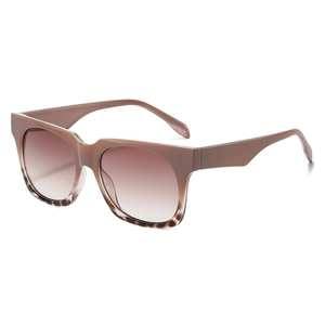 Classic oversized square sunglasses with nude frames and tortoiseshell accents on white background