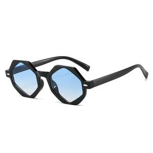 Lunettes de soleil géométriques hexagonales avec monture noire et verres dégradés bleus