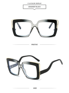 Macro view of square frame sunglasses in gradient black with gold metal trim and C12 details