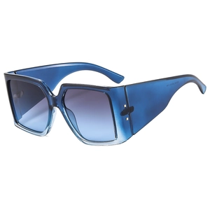 Lunettes de soleil carrées oversize avec monture bleue translucide et verres dégradés