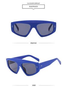 Front and side view of chunky blue geometric oversized sunglasses with dark gray lenses