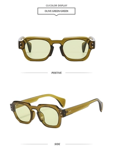 Detail view of olive green geometric glasses frame with silver dot accents and tinted lenses