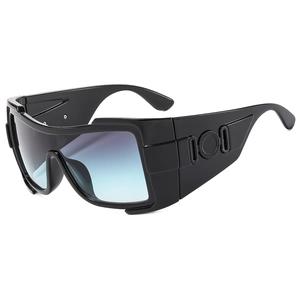 Oversized shield sunglasses with black frames and wide embossed temples for outdoor use