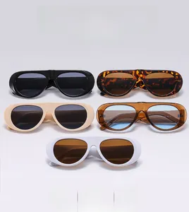 Détails de lunettes de soleil ovales vintage en noir classique, blanc et écaille de tortue