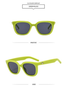 Detail of neon green square frame sunglasses with silver star decor and black lenses