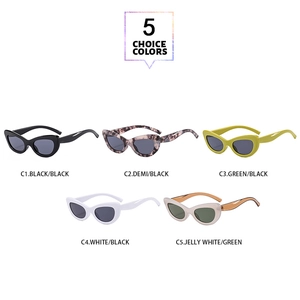 Detailed palette of five vintage cat-eye sunglasses in black, white, and tortoiseshell