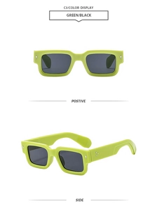 Detail view showing neon green rectangular frames and metallic rivets on wide sunglasses