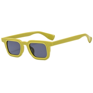 Retro square yellow sunglasses with dark lenses in futuristic punk hip-hop style