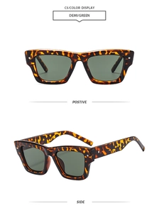 Detail view of tortoiseshell square sunglasses with metal rivets and dark green lenses