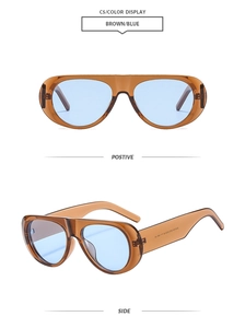 Détails de lunettes de soleil vintage avec monture en acétate brun et verres bleus