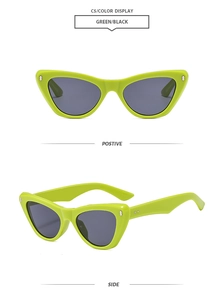 Close-up of fluorescent green cat-eye sunglasses frame with silver metal rivets detail