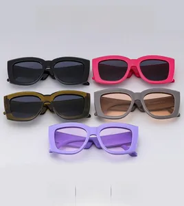 Matrix layout of wide-leg square sunglasses in five trendy colors including green and purple