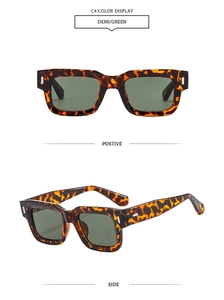 Detail view of vintage square sunglasses with demi tortoise frames and green lenses