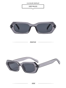 Detail of square vintage sunglasses with grey lenses and distinctive metal rivets
