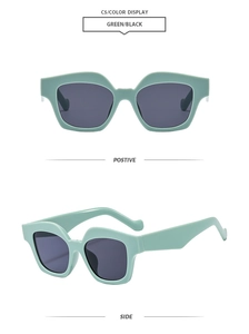 Detail view of mint green square frame sunglasses with dark UV protection lenses