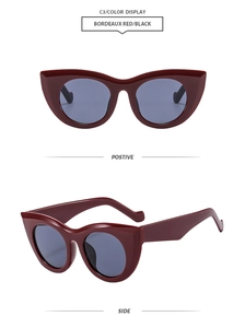 Detail view of Bordeaux red cat eye sunglasses with gray lenses and metallic hinges