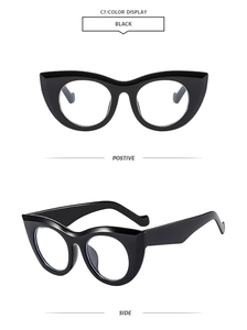 Detailed front and side view of premium black cat-eye sunglasses with thick retro frames
