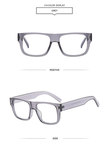 Detail view of grey square sunglasses with classic rivets and premium frame material