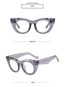 Macro view of grey translucent cat-eye frame showing smooth finish and temple details