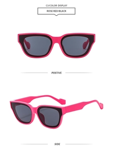 Detail view of stylish rose red and black dual-tone sunglasses from front and side angles