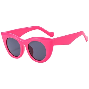 Thick pink cat eye sunglasses with grey lenses for fashion-forward women and street style