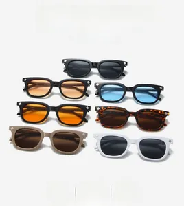 Flat lay of retro square sunglasses in seven colorways with silver diamond accents