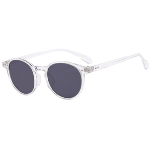 Retro oval sunglasses with transparent frames and dark gray lenses for a street fashion look