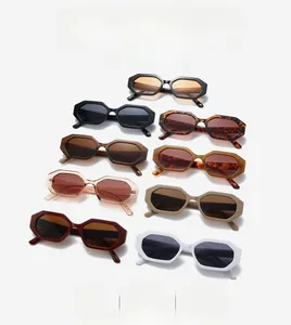 Flat lay display of colorful octagonal frame sunglasses in various trendy acetate finishes