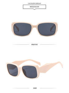 Detail view of beige rectangular sunglasses with wide temples and dark grey lenses