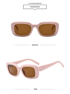 Detail view of pink square retro sunglasses with brown lenses and wide side temples