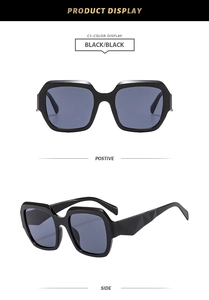 Detail view of square oversized sunglasses with geometric temples in black