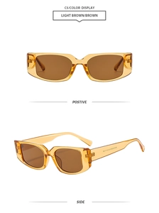 Vue macro des lunettes de soleil rectangulaires rétro marron clair avec cadre brillant