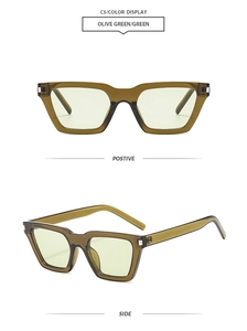 Detail view of retro square olive green sunglasses with translucent frames and green lenses