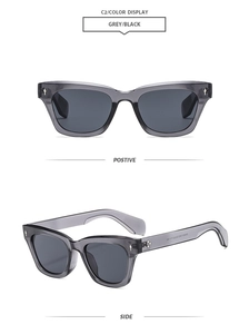 Detail of grey translucent square sunglasses with silver rivets and black lenses