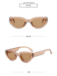 Retro-Cateye-Sonnenbrille mit teefarbenem Rahmen, weißen Akzenten und braunen Gläsern