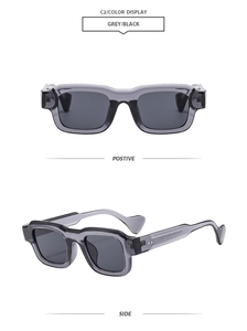 Detail of square transparent frames and grey lenses with chic silver stud accents